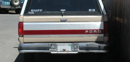 rear of pickup truck with Sniff and 213 stickers